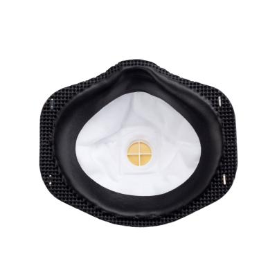 Vista interna de la mascarilla 3M 8833 que muestra el anillo de sellado facial perimetral acolchado en color negro y la membrana interna de la válvula.