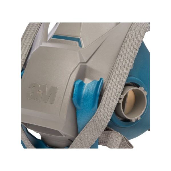 Primer plano del mecanismo Quick Latch frontal de color azul y el conector tipo bayoneta para filtros en la máscara industrial 3M 6502QL.